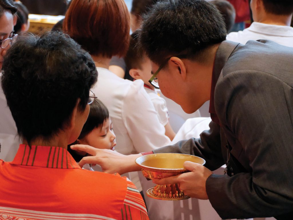 With prayers and rituals specially composed by H.E Tsem Rinpoche, Kechara Pastors bless the minds of the young for wisdom and protection at a Children's Baptismal ceremony.