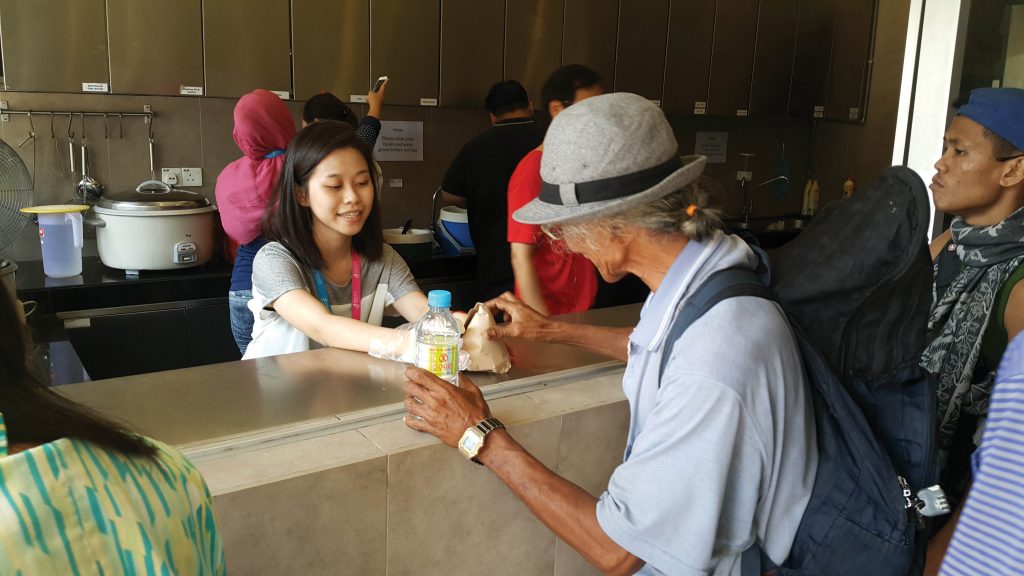 Volunteers of all ethnicities and faiths come together at Kechara Soup Kitchen to offer help to those who need it because "hunger knows no barriers."